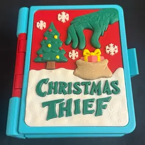 Christmas Thief and his dog 3D Print Christmas Decor Book with Festive Tree and Snowflake Design