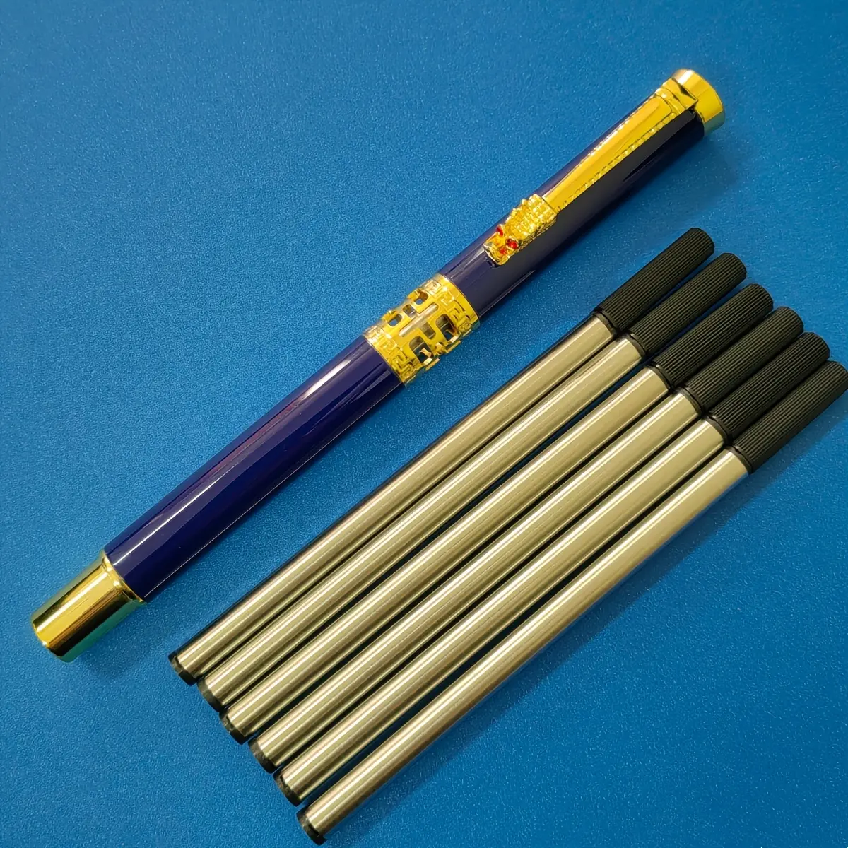 1 pc deep blue pen + 6 pcs black refills