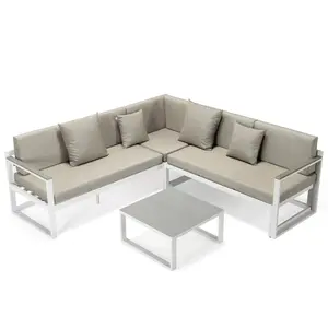 Chelsea White Sectional With Adjustable Headrest & Coffee Table With Cushions