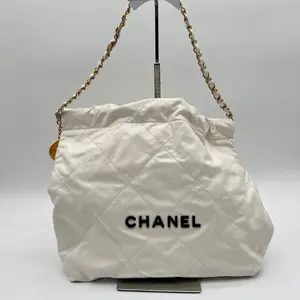 Pre-owned CHANEL leather Backpacks 22 Handbag Shiny Calfskin & Gold Tone Metal White