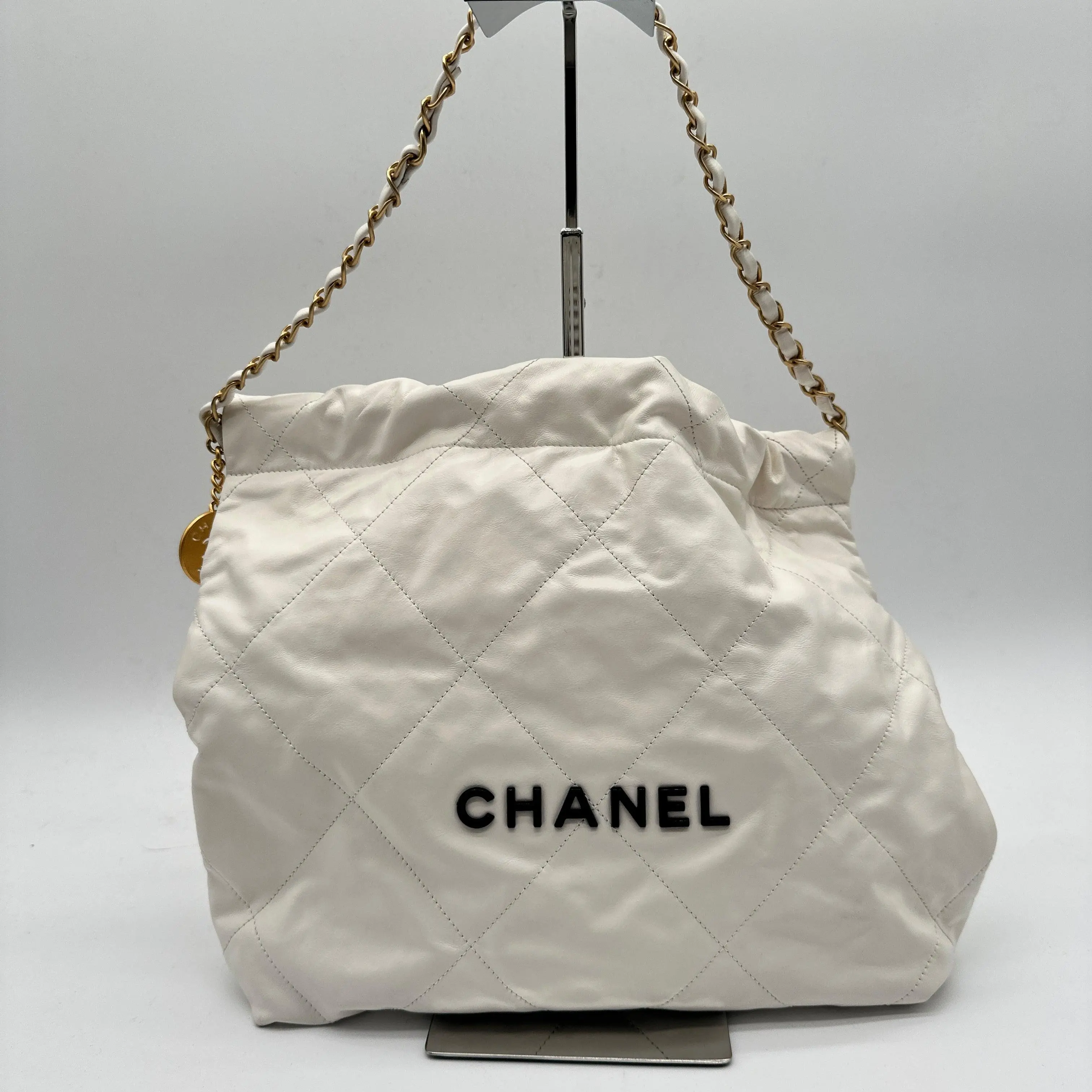 Pre-owned CHANEL leather Backpacks 22 Handbag Shiny Calfskin & Gold Tone Metal White