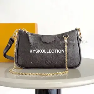 monogram-style luxury-inspired wallet, brown checker pattern