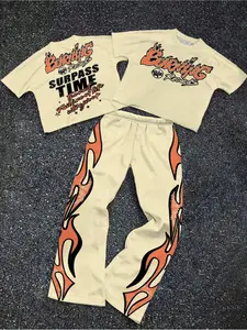 New men’s hip-hop-style short-sleeved top and trousers set. This two-piece set features a round-neck short-sleeved top with graphic print and drawstring trousers, offering a stylish, casual look perfect for everyday wear. A two-piece men’s set comprising