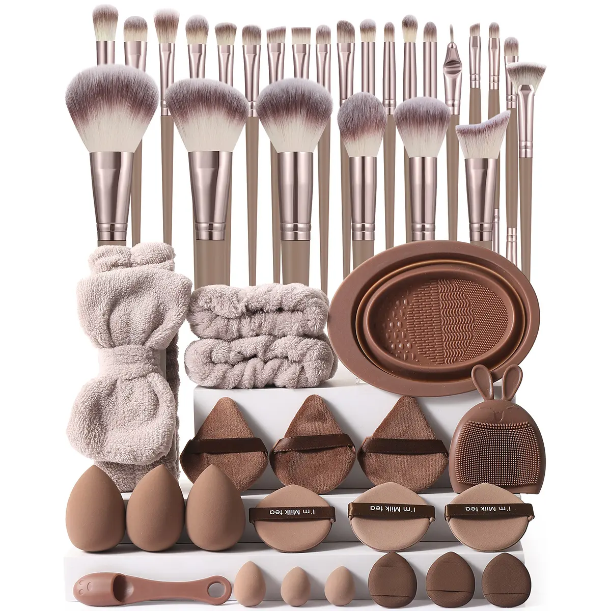 46 piece makeup tool set, including 25 makeup brushes set, 6 powder puffs, 1 brush cleaning tool, 3 large and 3 small makeup balls, 1 plush headband, 2 wristbands, 4 finger powder puffs, and 1 silicone brush. Complete Cosmetic Kit for Beginners