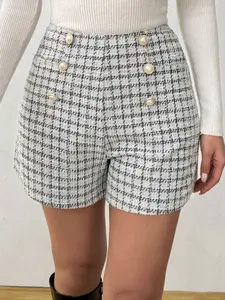 A ladies' high-waisted buttoned dress pants with peacock pattern and wide legs, perfect for elegant business attire and versatile wear.