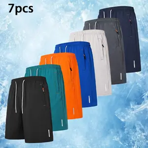 Men's solid color athletic shorts with an elastic waistband, practical side zip pockets, reflective details, suitable for gym workouts, outdoor adventures, and casual summer wear.