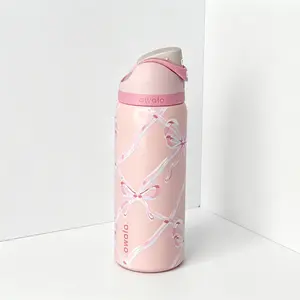Owala 32oz FreeSip Insulated Stainless Steel Water Bottle with Straw, Cute Pink Bow Print. Keeps drinks hot and cold, suitable for both hot and cold beverages. Ideal for sports, travel, fitness, and school use. BPA-free,  Drinkware