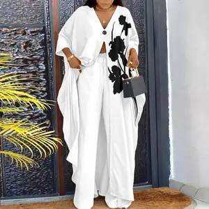 2025 Women’s Abstract Print High-Slit Longline Top & Pants Two-Piece Set – Elegant Casual Fabric Outfit, can be paired with a raincoat