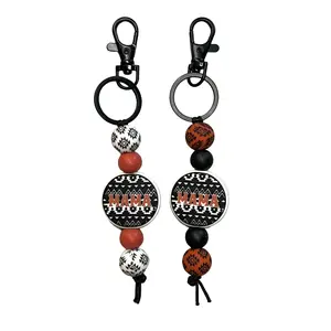 White/Rust Aztec Tooled Mama Keychain