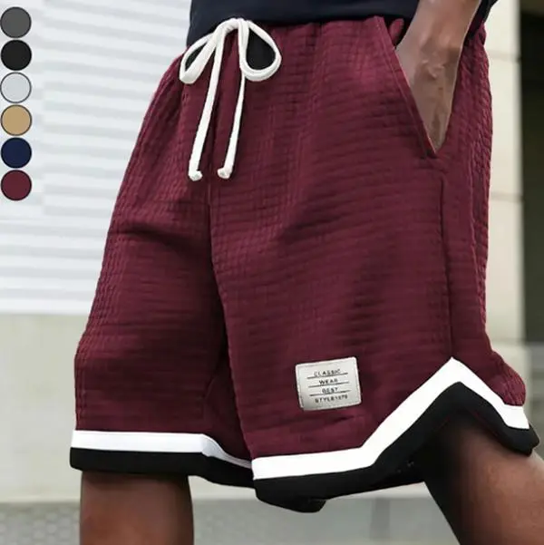 Men’s waffle knit shorts with elastic drawstring waist; summer casual style; stretchy, breathable, soft fabric; available in multiple colors for versatile wear; stylish and casual.