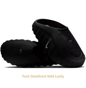Black Thick-Soled Massage Slides, Orange Spherical Outsole, Breathable Fabric Upper, Pre-Game Recovery Tech Mules