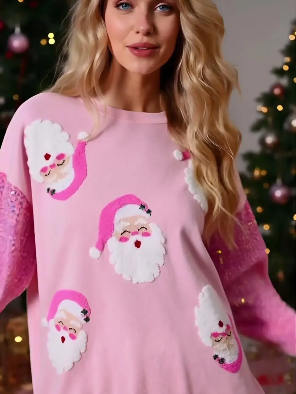 True Gleam Women's Christmas Santa Sweatshirt Sequin Long Sleeve Crew Neck Pullover Top Casual Streetwear in Pink with Embroidered Santa Faces and Sparkling Sleeves - Fabric