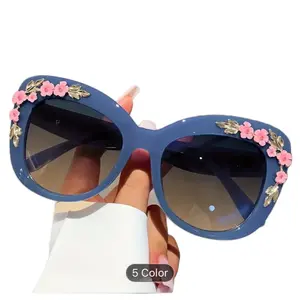 Blue Dark Lensed Sunglasses with Pink Floral Embellishments for Women MY NUMBER 1 complimented sunglasses l!!!
