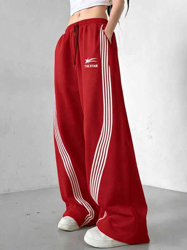 Women's Wide-Leg Track Pants, elastic drawstring waist with contrast side stripes and "THE STAR" logo print, relaxed fit for streetwear, dance and casual daily wear, available in multiple colors
