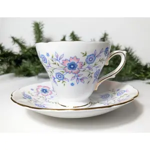 Vintage 1974 Avon Blue Blossoms Cup and Saucer Set
