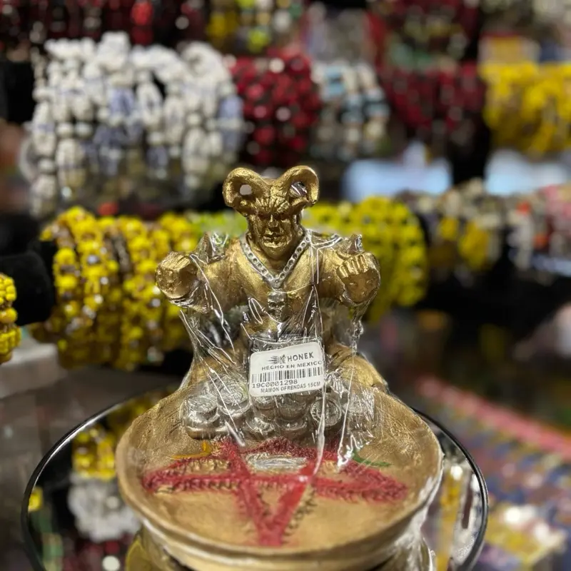 Gold mammon statue