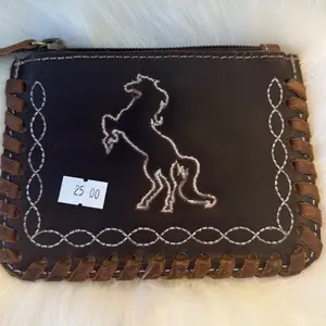 Distressed leather coin pouch Distressed leather coin pouch