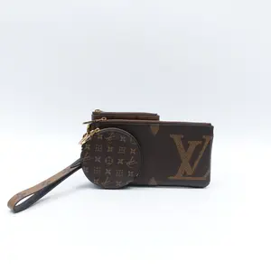 Pre-owned Louis Vuitton canvas Clutches & Wristlets Trio Monogram Giant Reverse Brown Clutch T10399097