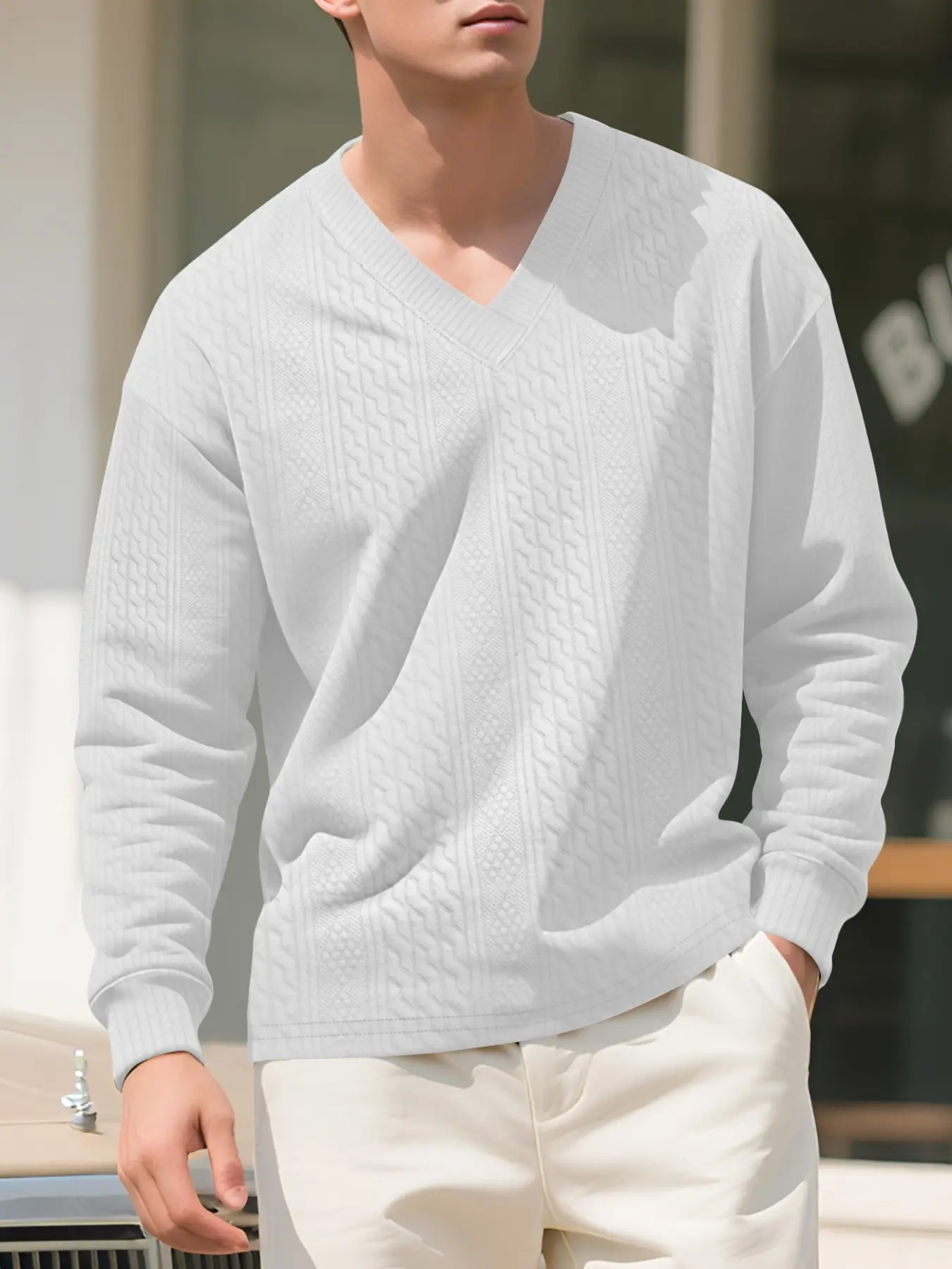 A men's solid color casual knitted V-neck long-sleeved sweater, loose version of casual and comfortable fabric, suitable for daily wear in and winter men's tops, men's long-sleeved knitted sweater.