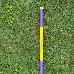 1 of 1 limited edition yellow and Purple custom sharpie WiffleBall bat
