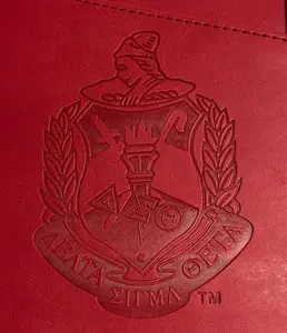 Delta Sigma Theta (ΔΣΘ) Sorority Artificial Leather NOTEBOOK- organizational shield print on front Red Color.