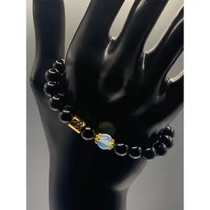 Capricorn Zodiac black obsidian with opalite elastic beaded bracelet with gold accents