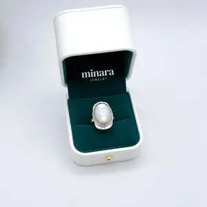 950 Silver Oval Ring With a Twisted Design In Natural MOTHER OF PEARL Crafted in 950 Sterling Silver.