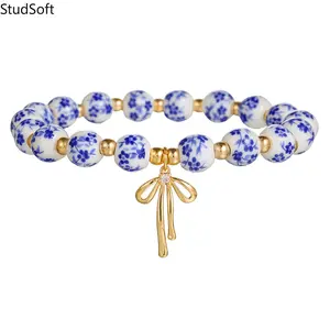 2026 New Arrival: Chinese-Style Blue and White Porcelain Beaded Bracelet — A Gift for Best Friends | Women's Copper Bracelet with Zircon-Inlaid Bowknot Pendant
