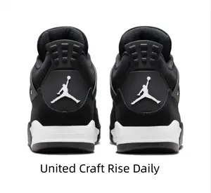Timeless Black and White Mid-Top Sneakers with Suede Texture for Casual and Sporty Occasions