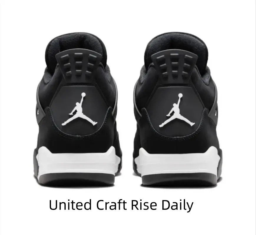 Timeless Black and White Mid-Top Sneakers with Suede Texture for Casual and Sporty Occasions