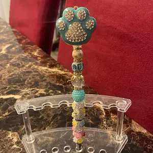 Rhinestone Blue Paw Print on a Multicolored Paw Print Pen with Sparkling Beads and Elegant Design