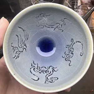 Master Jianzhan handcrafts tea cups with thin frames and hollowed out master cups