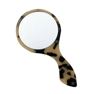 Cute handheld makeup mirror with handle — creative cosmetic salon mirror