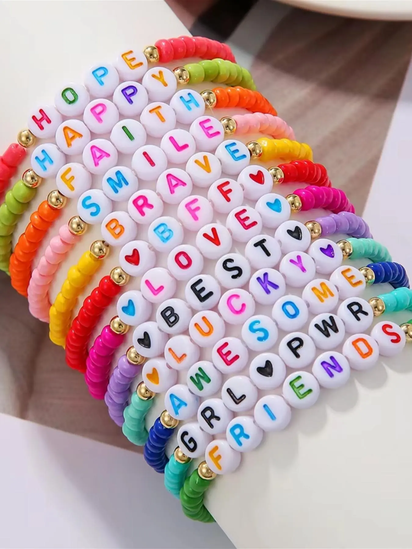 The 12 piece set of colorful soft ceramic bracelets with English names is suitable for daily wear, vacation dates, and other occasions. It is also a surprising and exquisite small gift, Layered Stackable Bracelet set, Stacking Bracelet