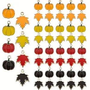 100 pumpkin and maple leaf ornaments - Autumn Halloween Thanksgiving decorations, in colors of orange, red, black, and yellow - suitable for DIY jewelry making, keychains, necklaces, bracelets, earrings - autumn crafts, Thanksgiving party gifts, Halloween