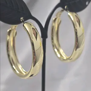 Elegant medium gold hoops with 3 cm diameter, high-quality gold-plated.