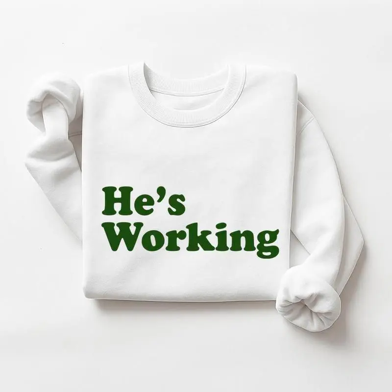 He Is Working Sweatshirt, Funny Work-Inspired Unisex Pullover, Cozy Motivational Crewneck Gift for Hard Workers