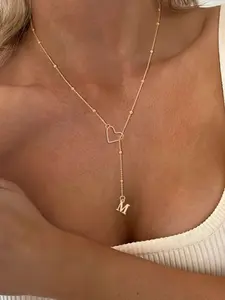 Fashionable hollowed out heart-shaped letter necklace with 26 letter stainless steel bead chain and bone chain, suitable for daily wear, vacation and dating occasions, and also a surprising and exquisite jewelry gift