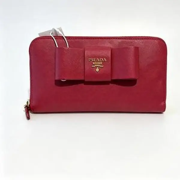 Pre-owned PRADA Bright Red Saffiano Leather Zip Wallet Decorative Front Bow Gold Logo Plaque