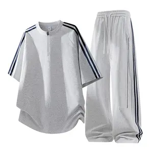 Men’s athletic casual set in light gray with stripes, half-zip stand collar, drawstring wide-leg pants, breathable short sleeves for summer—two-piece set
