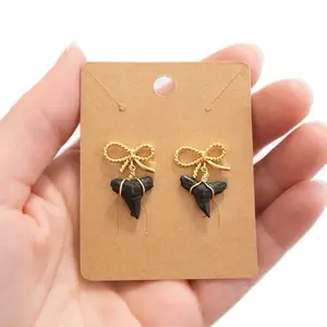 Gold Bow Shark Tooth Dangle Earrings