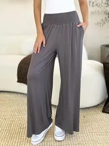 Basic Bae Full Size Smocked Wide Waistband Wide Leg Pants in Opaque Rayon Spandex Blend for Comfort and Style