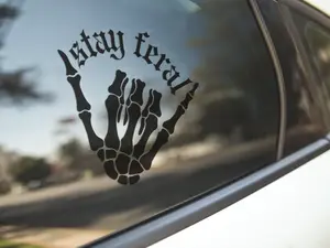Stay Feral Skeleton Hand Car Decal – Gothic Horror Vinyl Sticker for Cars, Trucks & Windows