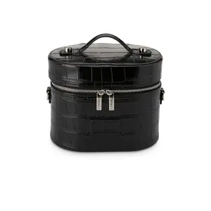 ETOILE COLLECTIVE Oval Toiletry Case in Noir Croc