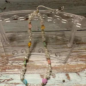 Pearl and rainbow heart phone chain