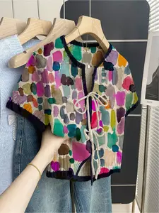 Women's khaki bohemian vacation short-sleeve knit top. Loose round neck, contrast color print, front tie and contrast piping. Comfortable for spring & summer casual wear.