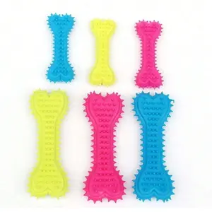 Polkadot Bone-shaped Dog Interactive Chew Toy with durable rubber for teeth cleaning, a fun and training toy for dogs