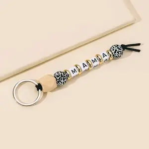 Mama Cow Print Beaded Keychain
