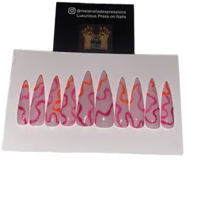 Melanated Expressions White Glow in the Dark Stiletto Press On Nails with Neon Pink and Orange Swirl Design