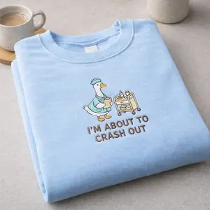 [MADE IN US] Nurse Duck Embroidered Sweatshirt, I’m About to Crash Out Quote, Funny Nurse Burnout, Healthcare Humor Crewneck